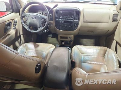 Zdjęcie 8 z 13 samochodu: 2001 FORD ESCAPE XLT VIN:1FMYU03111KF43404 - miniatura