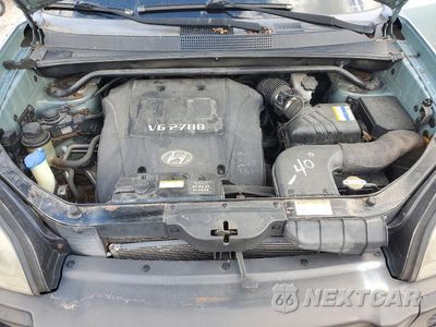 Zdjęcie 12 z 13 samochodu: 2007 HYUNDAI TUCSON SE VIN:KM8JN72D97U667131 - miniatura
