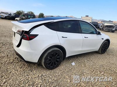 Trzecie zdjęcie samochodu z tyłu: 2024 TESLA MODEL Y VIN:7SAYGDEE9RA259854 - miniatura