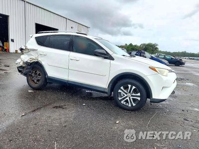 Czwarte zdjęcie samochodu z boku: 2018 TOYOTA RAV4 LE VIN:JTMBFREV1JJ734755 - miniatura