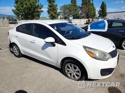 Czwarte zdjęcie samochodu z boku: 2014 KIA RIO LX VIN:KNADM4A3XE6328520 - miniatura
