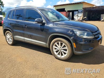 Czwarte zdjęcie samochodu z boku: 2017 VOLKSWAGEN TIGUAN S VIN:WVGBV7AXXHK050883 - miniatura