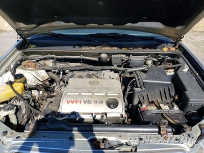 Zdjęcie 12 z 13 samochodu: 2005 TOYOTA HIGHLANDER BASE VIN:JTEEP21A250087973 - miniatura