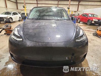Piąte zdjęcie samochodu w środku: 2024 TESLA MODEL Y VIN:7SAYGDEEXRF991008 - miniatura
