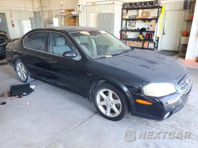 Czwarte zdjęcie samochodu z boku: 2002 NISSAN MAXIMA GXE VIN:JN1DA31D12T422851 - miniatura