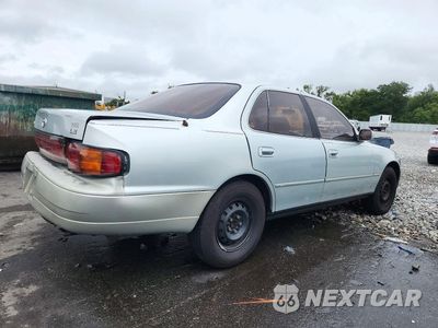 Trzecie zdjęcie samochodu z tyłu: 1994 TOYOTA CAMRY LE VIN:4T1SK12E1RU361238 - miniatura