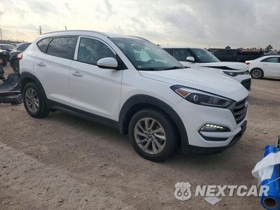 Czwarte zdjęcie samochodu z boku: 2016 HYUNDAI TUCSON SE VIN:KM8J33A47GU026799 - miniatura