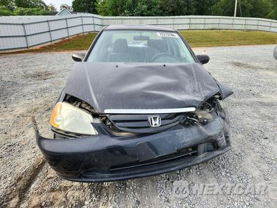 Piąte zdjęcie samochodu w środku: 2003 HONDA CIVIC LX VIN:2HGES16593H607072 - miniatura
