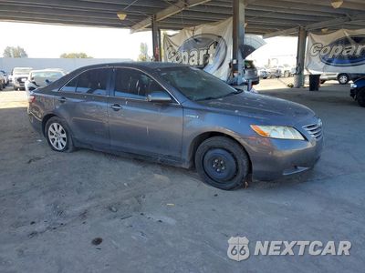Czwarte zdjęcie samochodu z boku: 2007 TOYOTA CAMRY HYBRID VIN:JTNBB46K573040114 - miniatura