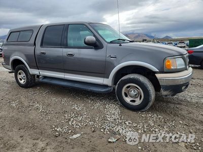 Czwarte zdjęcie samochodu z boku: 2002 FORD F150 SUPERCREW VIN:1FTRW08L32KB51524 - miniatura