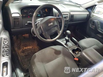 Zdjęcie 8 z 13 samochodu: 2003 JEEP GRAND CHEROKEE LAREDO VIN:1J4GW48N23C555372 - miniatura