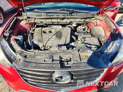 Zdjęcie 12 z 13 samochodu: 2016 MAZDA CX-5 GT VIN:JM3KE4DY0G0786143 - miniatura