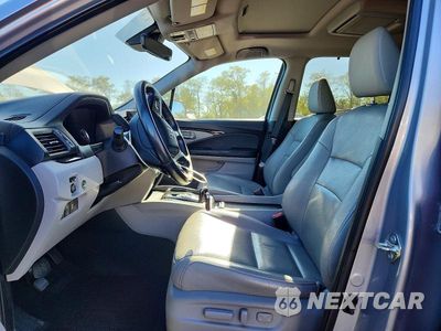 Zdjęcie 7 z 13 samochodu: 2019 HONDA PILOT TOURING VIN:5FNYF6H65KB001954 - miniatura