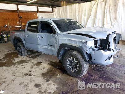 Czwarte zdjęcie samochodu z boku: 2021 TOYOTA TACOMA TRD OFF-ROAD VIN:3TYCZ5AN9MT045200 - miniatura