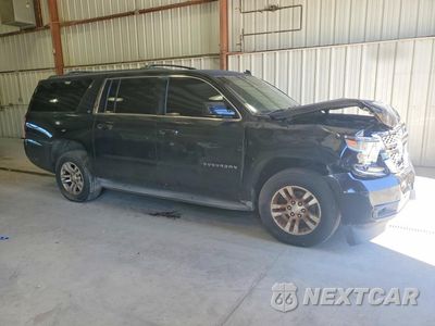 Czwarte zdjęcie samochodu z boku: 2015 CHEVROLET SUBURBAN K1500 LT VIN:1GNSKJKCXFR236117 - miniatura