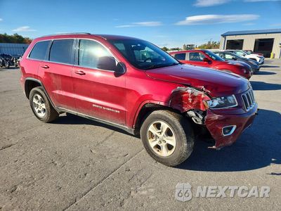 Czwarte zdjęcie samochodu z boku: 2014 JEEP GRAND CHEROKEE LAREDO VIN:1C4RJFAG2EC478087 - miniatura