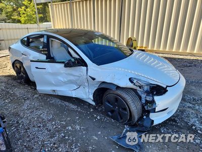 Czwarte zdjęcie samochodu z boku: 2023 TESLA MODEL 3 VIN:5YJ3E1EA3PF424757 - miniatura