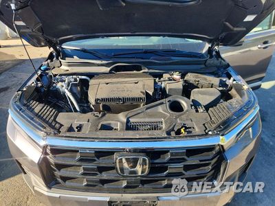Zdjęcie 12 z 14 samochodu: 2026 HONDA PILOT TOURING VIN:5FNYG1H71TB008863 - miniatura