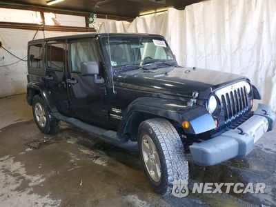 Czwarte zdjęcie samochodu z boku: 2012 JEEP WRANGLER UNLIMITED SAHARA VIN:1C4BJWEG5CL276093 - miniatura