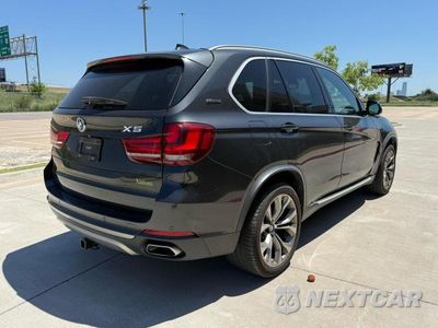 Czwarte zdjęcie samochodu z boku: 2018 BMW X5 XDRIVE40E VIN:5UXKT0C54J0W02939 - miniatura