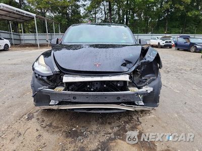 Piąte zdjęcie samochodu w środku: 2021 TESLA MODEL Y VIN:5YJYGDEE6MF186841 - miniatura