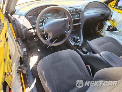 Zdjęcie 8 z 13 samochodu: 1999 FORD MUSTANG VIN:1FAFP4049XF137886 - miniatura