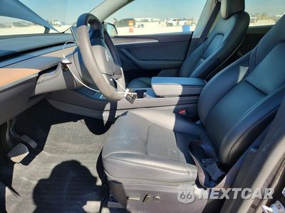 Zdjęcie 7 z 13 samochodu: 2024 TESLA MODEL Y VIN:7SAYGDEE7RA309280 - miniatura