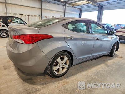 Trzecie zdjęcie samochodu z tyłu: 2013 HYUNDAI ELANTRA GLS VIN:KMHDH4AE4DU632988 - miniatura