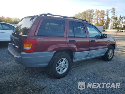 Trzecie zdjęcie samochodu z tyłu: 1999 JEEP GRAND CHEROKEE LAREDO VIN:1J4GW58S3XC609781 - miniatura