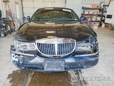 Piąte zdjęcie samochodu w środku: 2000 LINCOLN TOWN CAR SIGNATURE VIN:1LNHM82W8YY939512 - miniatura