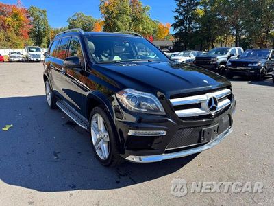 Czwarte zdjęcie samochodu z boku: 2015 MERCEDES-BENZ GL 550 4MATIC VIN:4JGDF7DE2FA544657 - miniatura
