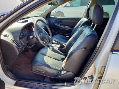 Zdjęcie 7 z 13 samochodu: 2000 NISSAN MAXIMA GXE VIN:JN1CA31A4YT023071 - miniatura