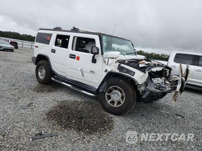 Czwarte zdjęcie samochodu z boku: 2005 HUMMER H2 VIN:5GRGN23U85H131159 - miniatura