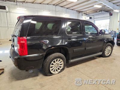 Trzecie zdjęcie samochodu z tyłu: 2012 CHEVROLET TAHOE HYBRID VIN:1GNSKDEJ1CR225546 - miniatura