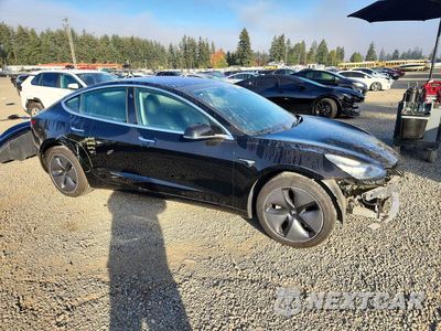 Czwarte zdjęcie samochodu z boku: 2019 TESLA MODEL 3 VIN:5YJ3E1EA1KF297094 - miniatura