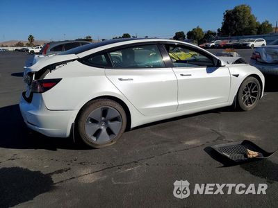 Trzecie zdjęcie samochodu z tyłu: 2021 TESLA MODEL 3 VIN:5YJ3E1EA8MF026973 - miniatura