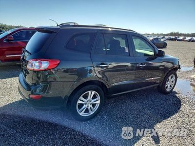 Trzecie zdjęcie samochodu z tyłu: 2012 HYUNDAI SANTA FE LIMITED VIN:5XYZK4AG6CG144851 - miniatura