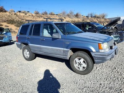 Czwarte zdjęcie samochodu z boku: 1995 JEEP GRAND CHEROKEE LAREDO VIN:1J4GZ58YXSC765157 - miniatura