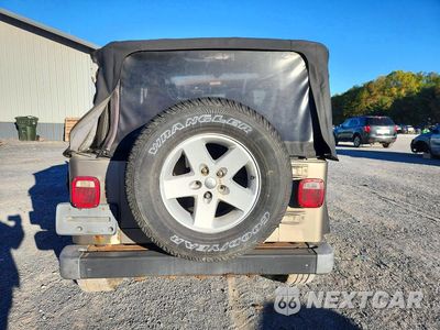 Zdjęcie 6 z 13 samochodu: 2003 JEEP WRANGLER COMMANDO VIN:1J4FA39S53P320143 - miniatura