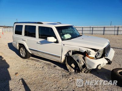 Czwarte zdjęcie samochodu z boku: 2009 JEEP COMMANDER LIMITED VIN:1J8HH58T29C530921 - miniatura