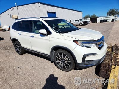 Czwarte zdjęcie samochodu z boku: 2019 HONDA PILOT ELITE VIN:5FNYF6H05KB042967 - miniatura