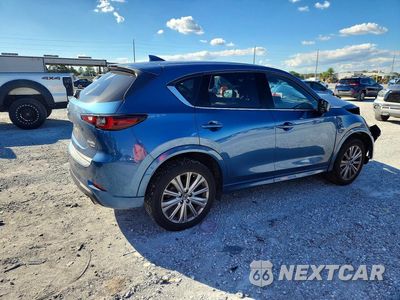 Trzecie zdjęcie samochodu z tyłu: 2023 MAZDA CX-5 SIGNATURE VIN:JM3KFBXY0P0229617 - miniatura