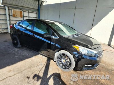 Czwarte zdjęcie samochodu z boku: 2014 KIA FORTE LX VIN:KNAFK4A60E5130737 - miniatura