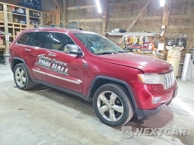 Czwarte zdjęcie samochodu z boku: 2013 JEEP GRAND CHEROKEE OVERLAND VIN:1C4RJFCT4DC581438 - miniatura