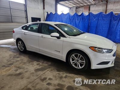 Czwarte zdjęcie samochodu z boku: 2018 FORD FUSION SE HYBRID VIN:3FA6P0LU9JR141404 - miniatura