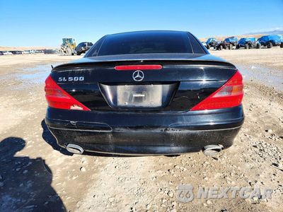 Zdjęcie 6 z 12 samochodu: 2004 MERCEDES-BENZ SL 500 VIN:WDBSK75F04F080569 - miniatura