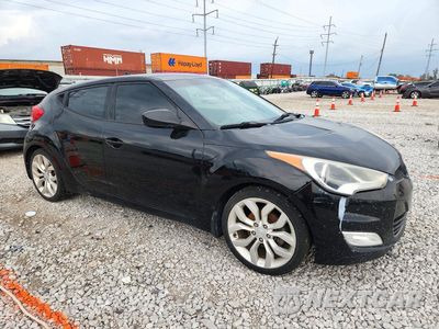 Czwarte zdjęcie samochodu z boku: 2013 HYUNDAI VELOSTER BASE VIN:KMHTC6AD7DU175400 - miniatura