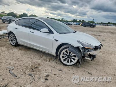 Czwarte zdjęcie samochodu z boku: 2022 TESLA MODEL 3 VIN:5YJ3E1EA2NF321472 - miniatura