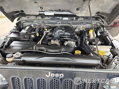 Zdjęcie 11 z 12 samochodu: 2015 JEEP WRANGLER UNLIMITED SAHARA VIN:1C4BJWEG4FL630318 - miniatura