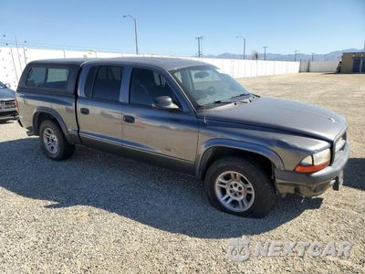Czwarte zdjęcie samochodu z boku: 2003 DODGE DAKOTA QUAD SPORT VIN:1D7HL38Z13S184586 - miniatura